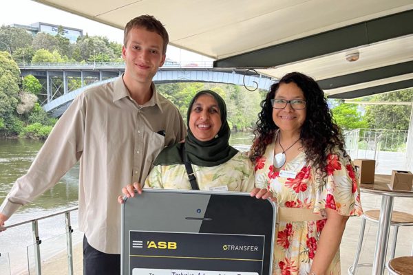 A photo of Staughm, Anjum and Lautalie receiving the grant from MOCA